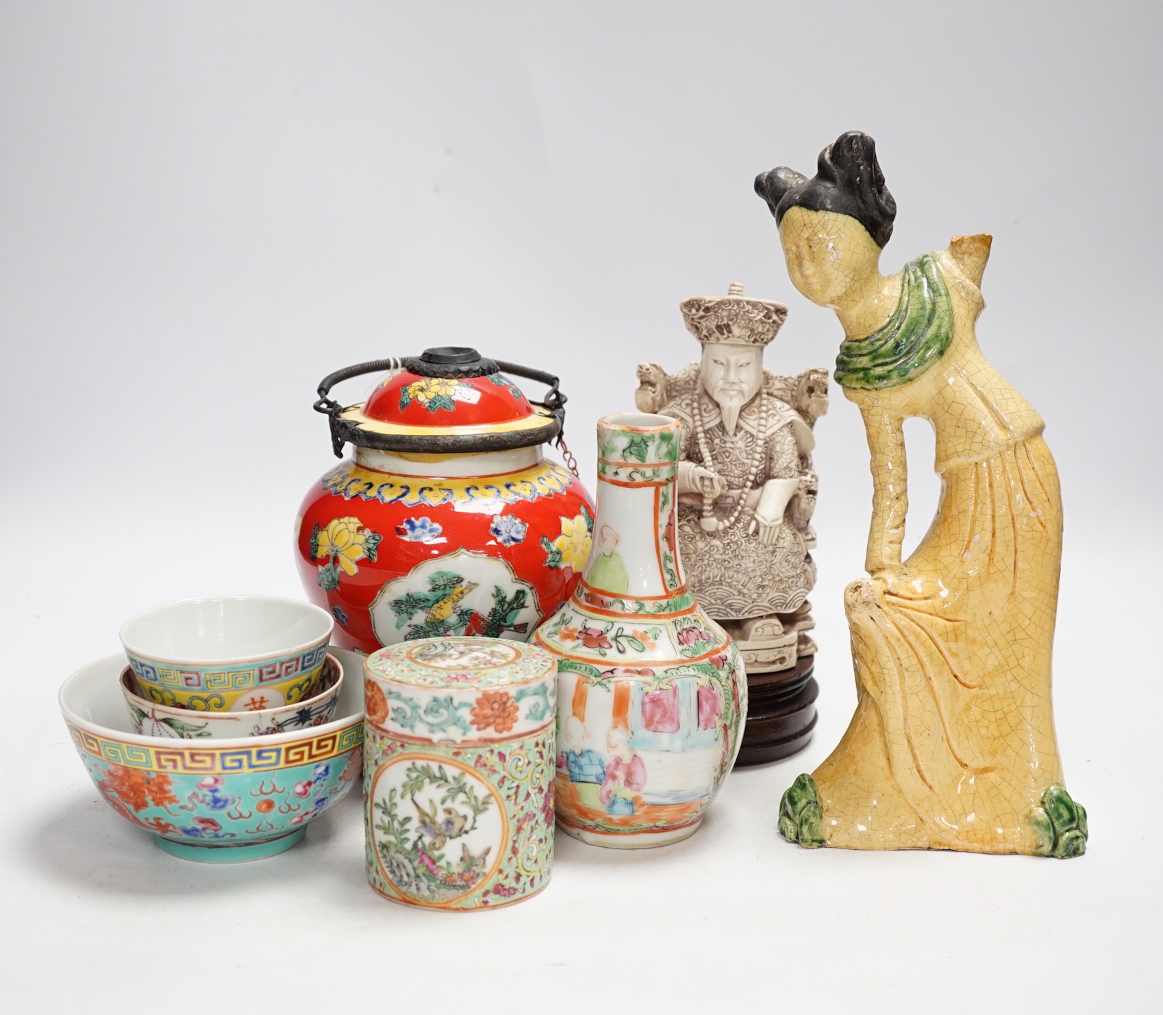 A group of Chinese ceramics 18th century and later, including a bottle vase, a water pipe vessel, box and cover, three bowls, a Tang style figure of a lady, a Yixing teapot, together with a resin figure of an emperor